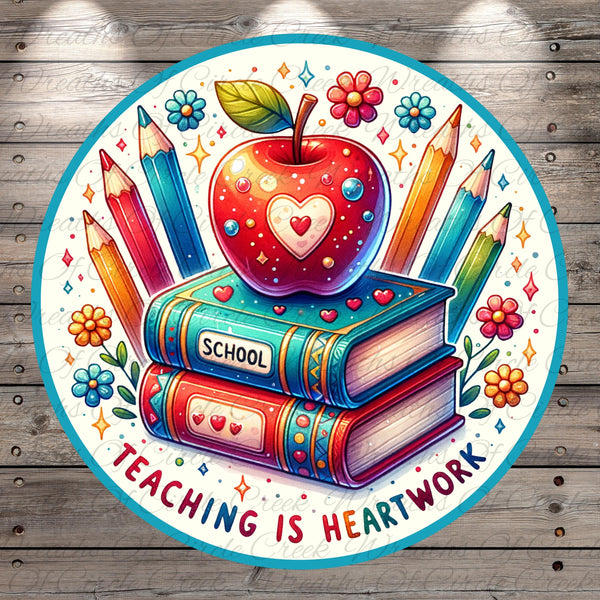 a plate with a picture of an apple on top of books