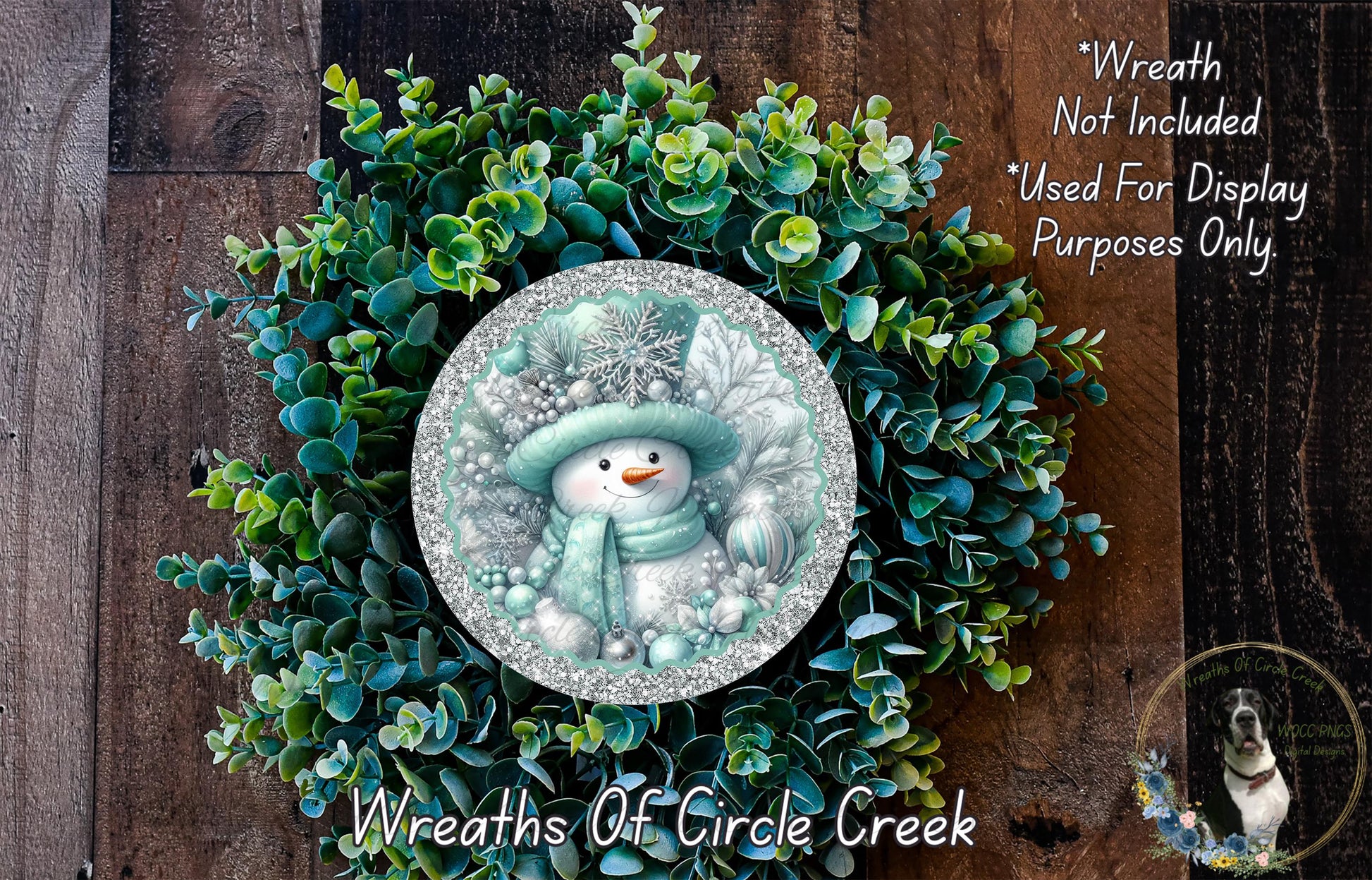 A wreath made of green leaves and a snowman decoration, with a text overlay that reads "Wreath Not Included * Used For Display Purposes Only" and "Wreaths Of Circle Creek".