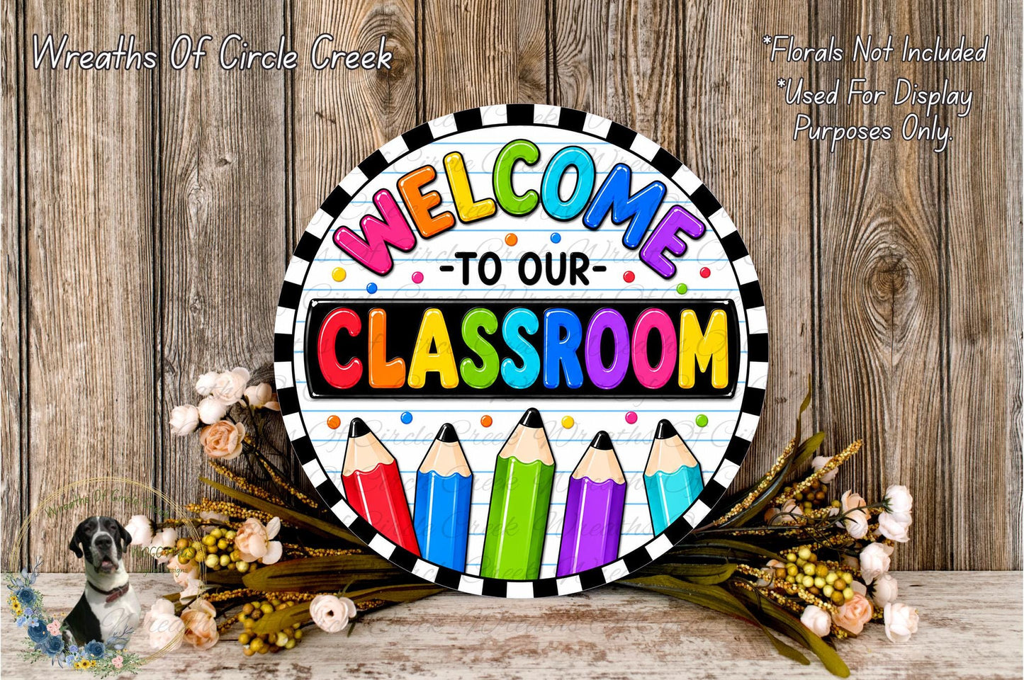 A colorful welcome sign for a classroom, featuring the text "Welcome to our classroom" surrounded by pencils and flowers.