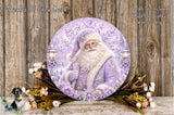 A round, decorative plate featuring a painting of Santa Claus surrounded by flowers and a snowy landscape.