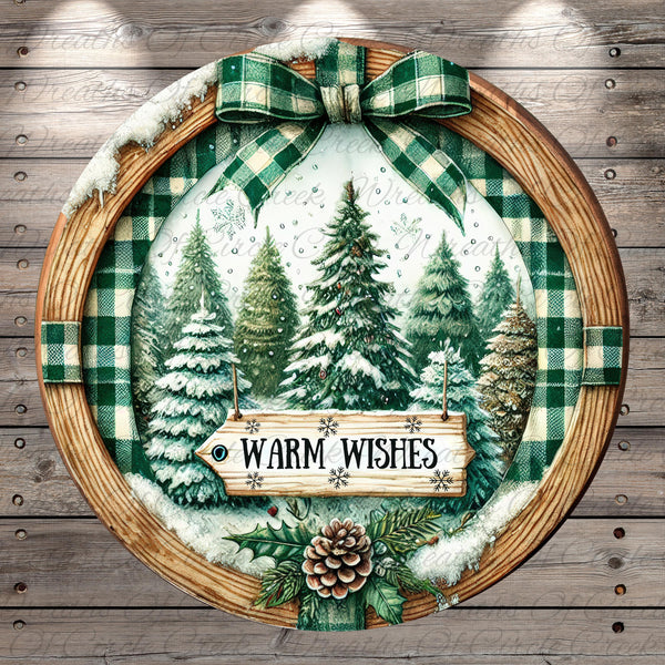 A round wooden frame with a winter scene of pine trees and a sign that says "Warm Wishes" in the center.