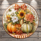 A decorative plate featuring a vibrant autumn scene with sunflowers, pumpkins, and other seasonal elements.