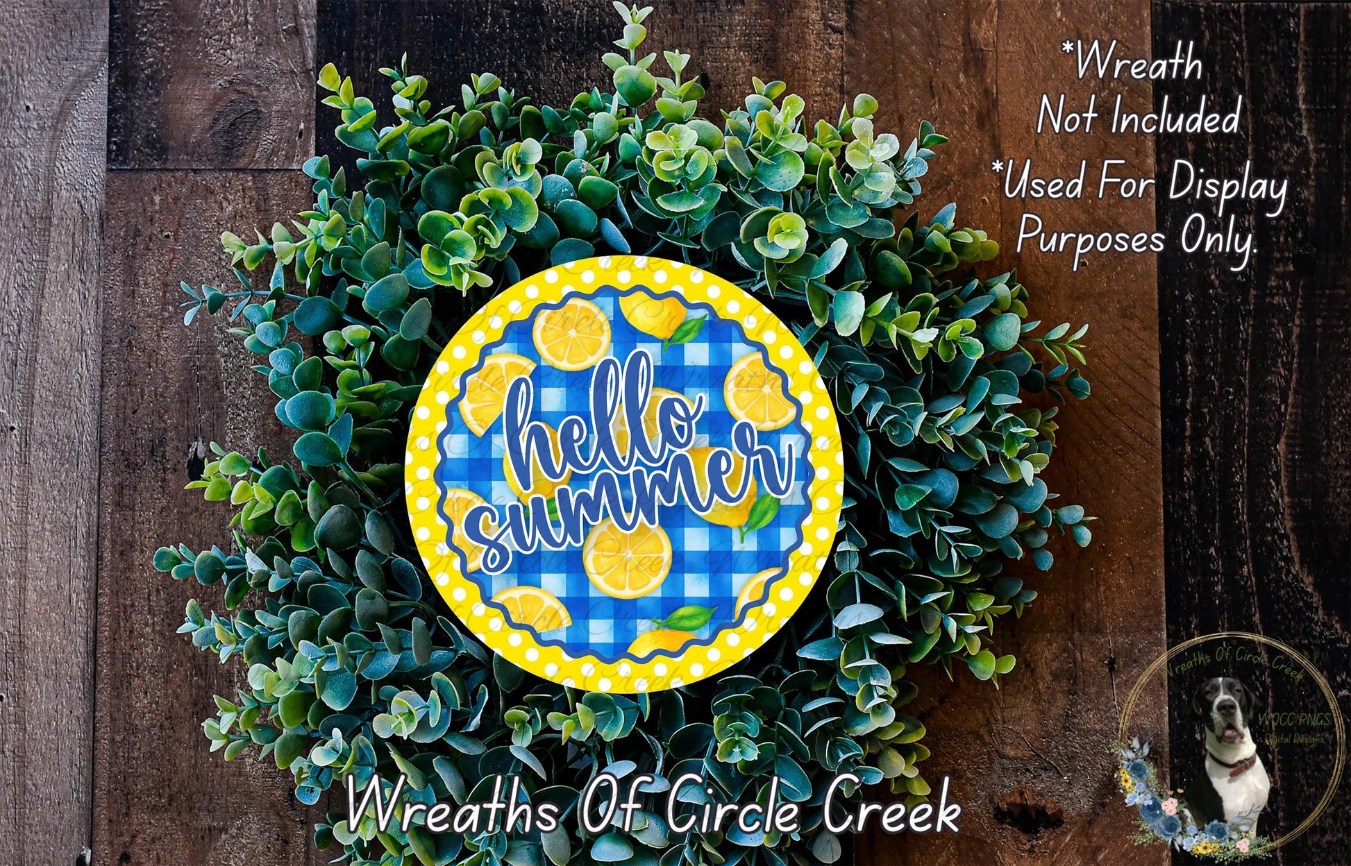 A wreath made of green leaves and topped with a yellow and blue circular sign that says "Hello summer".
