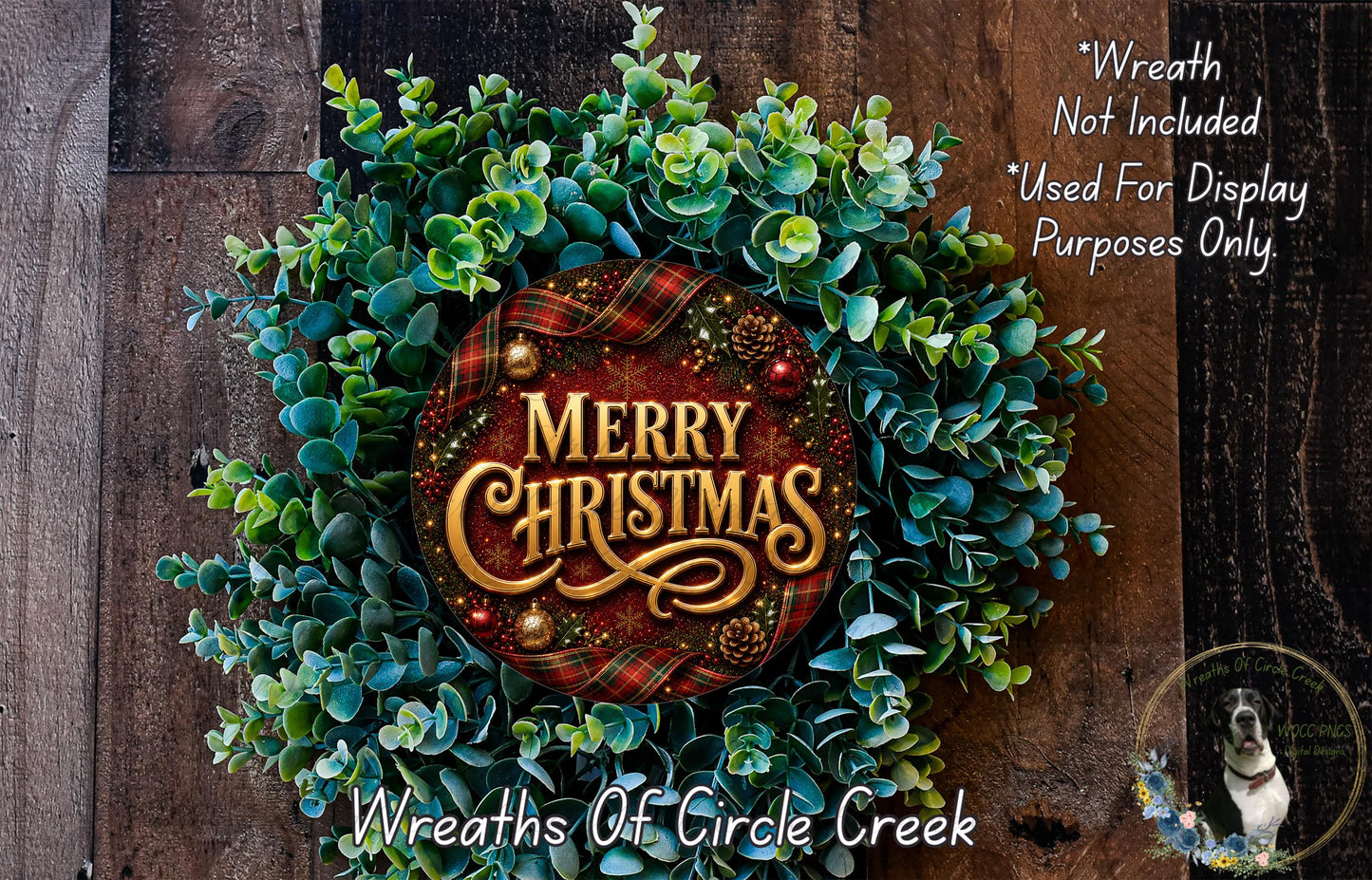 A festive Christmas wreath made of evergreen branches and a red and gold plaid banner with the text "Merry Christmas" displayed prominently in the center.