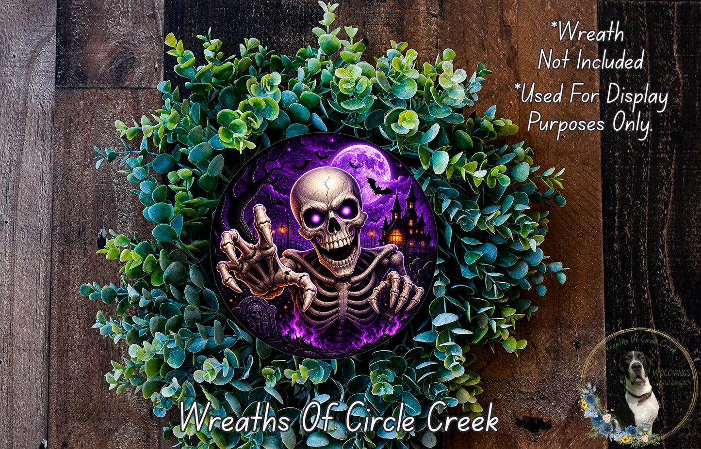 A wreath featuring a skeleton with glowing eyes and a purple background, surrounded by green foliage.