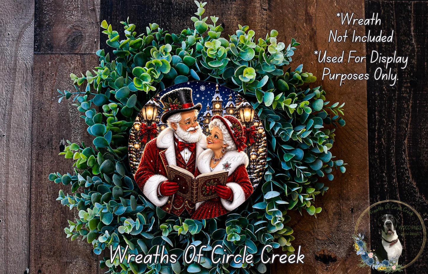 A wreath featuring Santa Claus and an elderly couple, with a Christmas tree and lights in the background. The wreath is surrounded by greenery and has a label that reads "Wreaths of Circle Creek".
