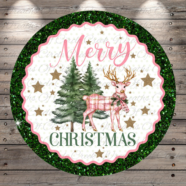 A circular Christmas-themed design with a pink and green color scheme, featuring a deer, pine trees, and stars. The text "Merry Christmas" is prominently displayed in the center of the design.