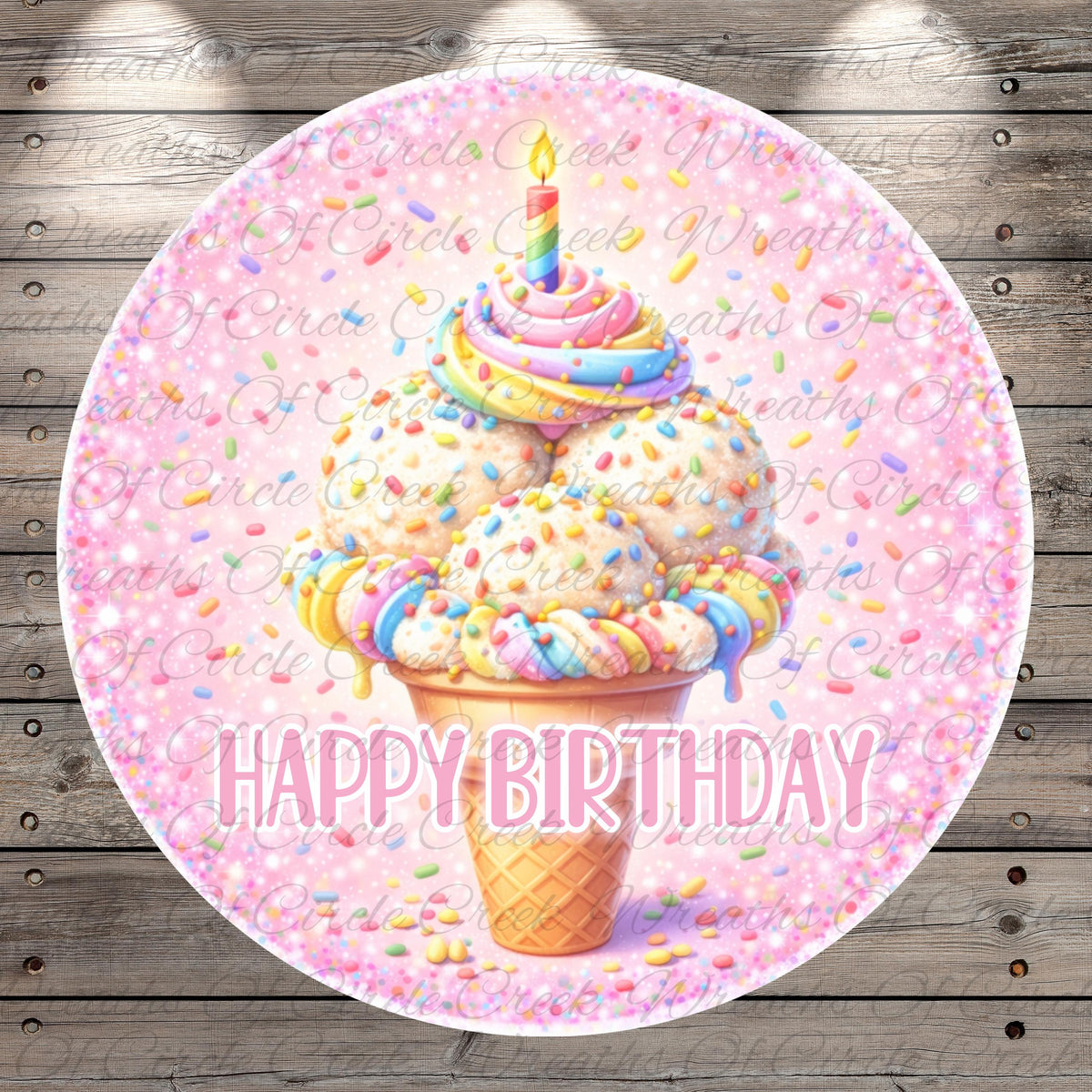 A round, pink-colored birthday cake with a candle and sprinkles, surrounded by the text "Happy Birthday" in a playful font.