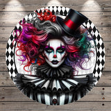 A digital illustration of a woman with striking makeup and a top hat, surrounded by a black and white checkered pattern.