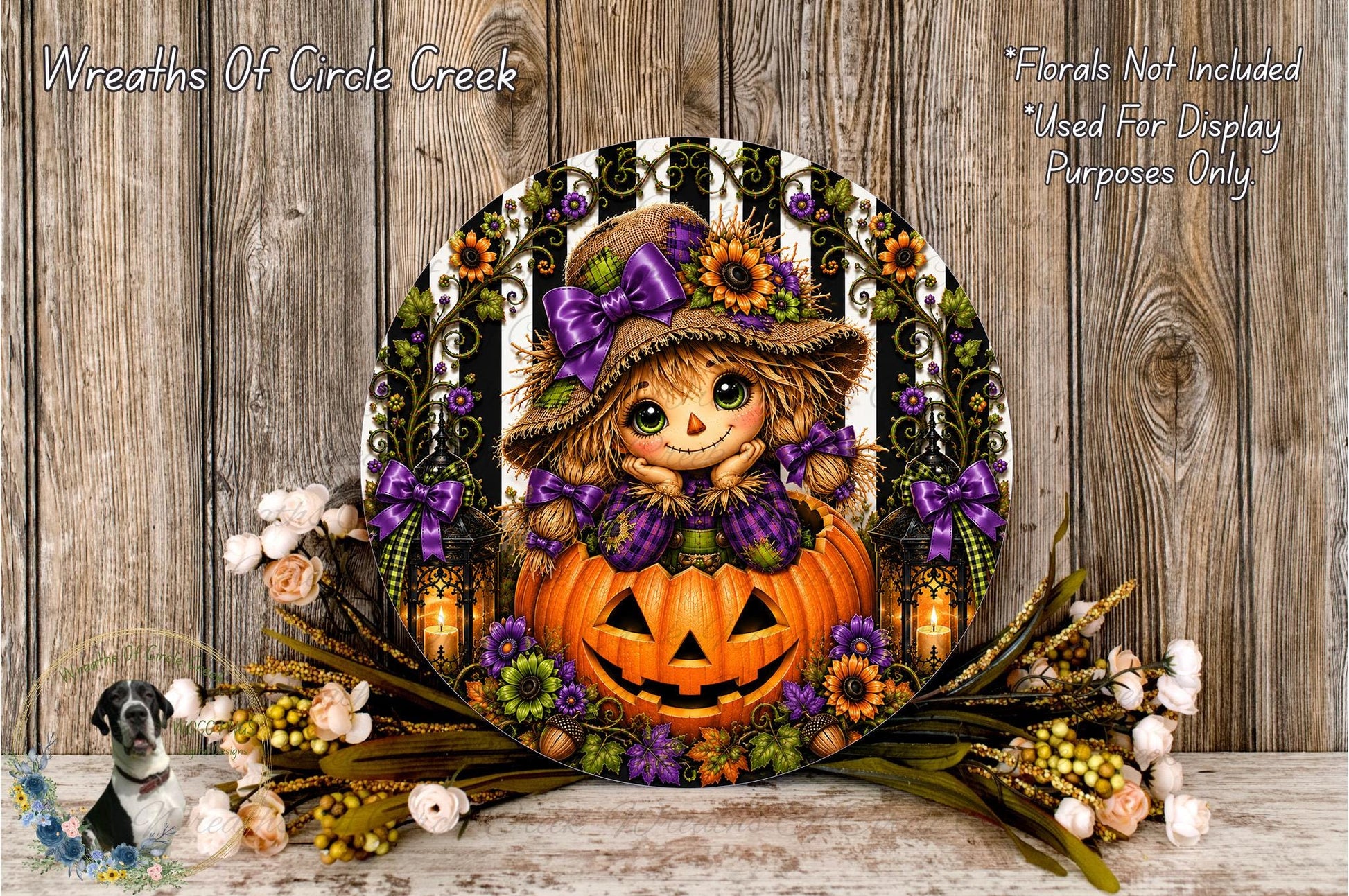 A Halloween-themed wreath featuring a scarecrow figure, a carved pumpkin, and various fall-themed decorations such as flowers and leaves.