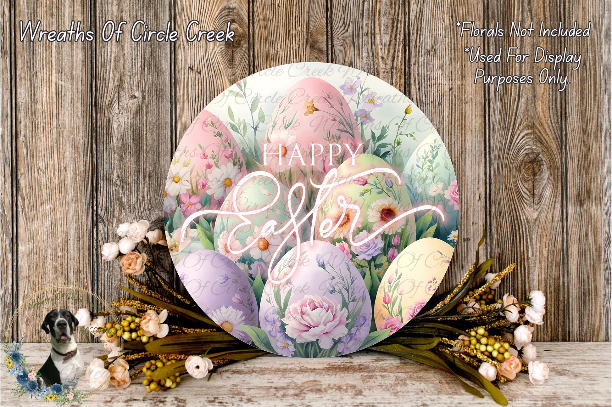 a round Easter wreath with a floral design and the text "Happy Easter" written on it. The wreath is surrounded by a variety of colorful Easter eggs and flowers, creating a festive and cheerful Easter display.