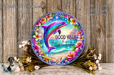 A colorful, circular wreath with a dolphin jumping out of the water, surrounded by flowers and a starfish. The wreath has the text "Good Vibes" and "Ocean Tide" written on it.