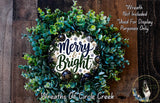 A wreath made of green leaves and ornaments, with the text "Merry & Bright" displayed on it.