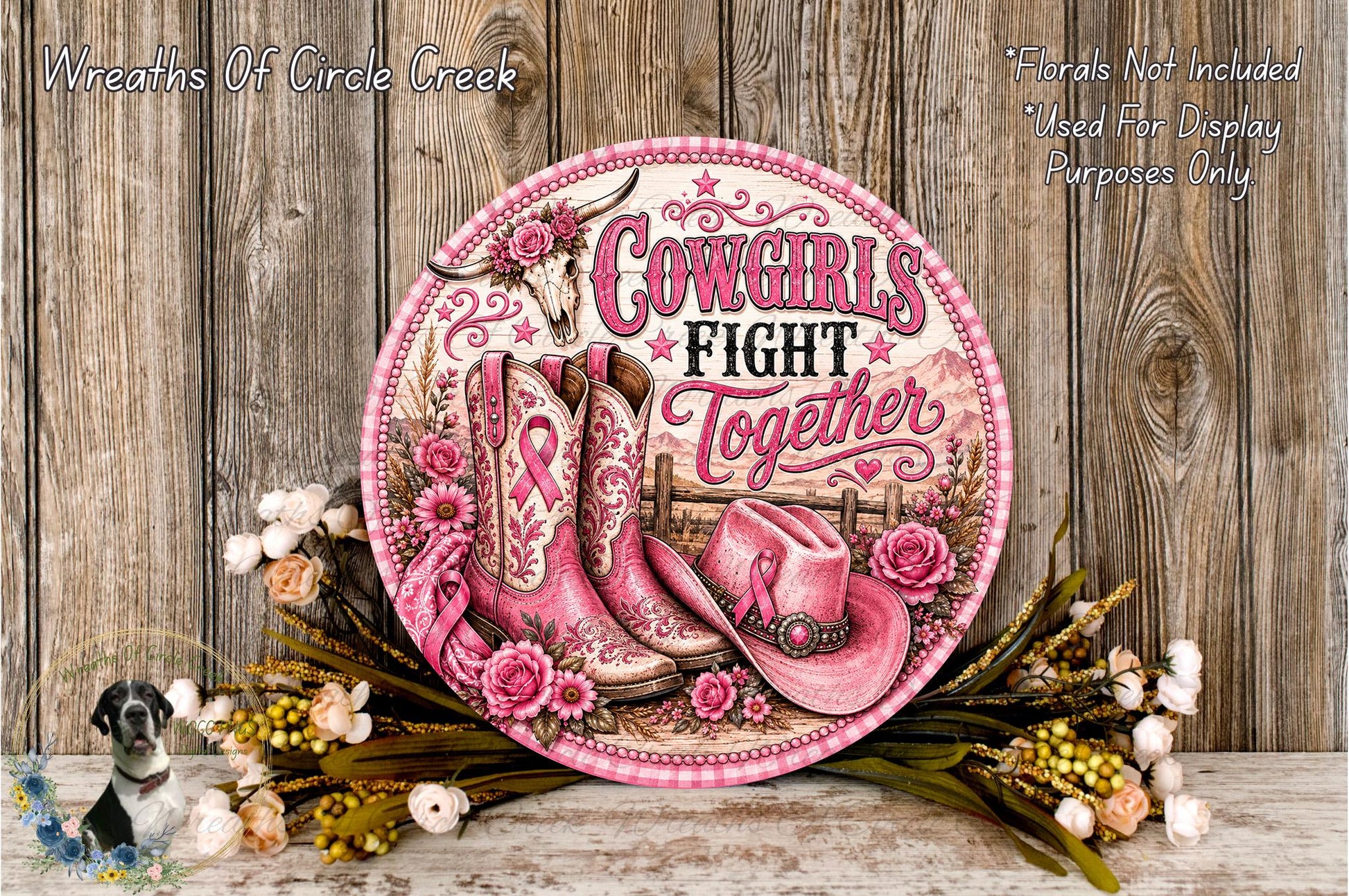 a decorative sign with the text "Cows fight together" surrounded by pink cowboy boots, a pink ribbon, and flowers. The sign is placed on a wooden surface, and there are additional flowers and a small bird in the background.