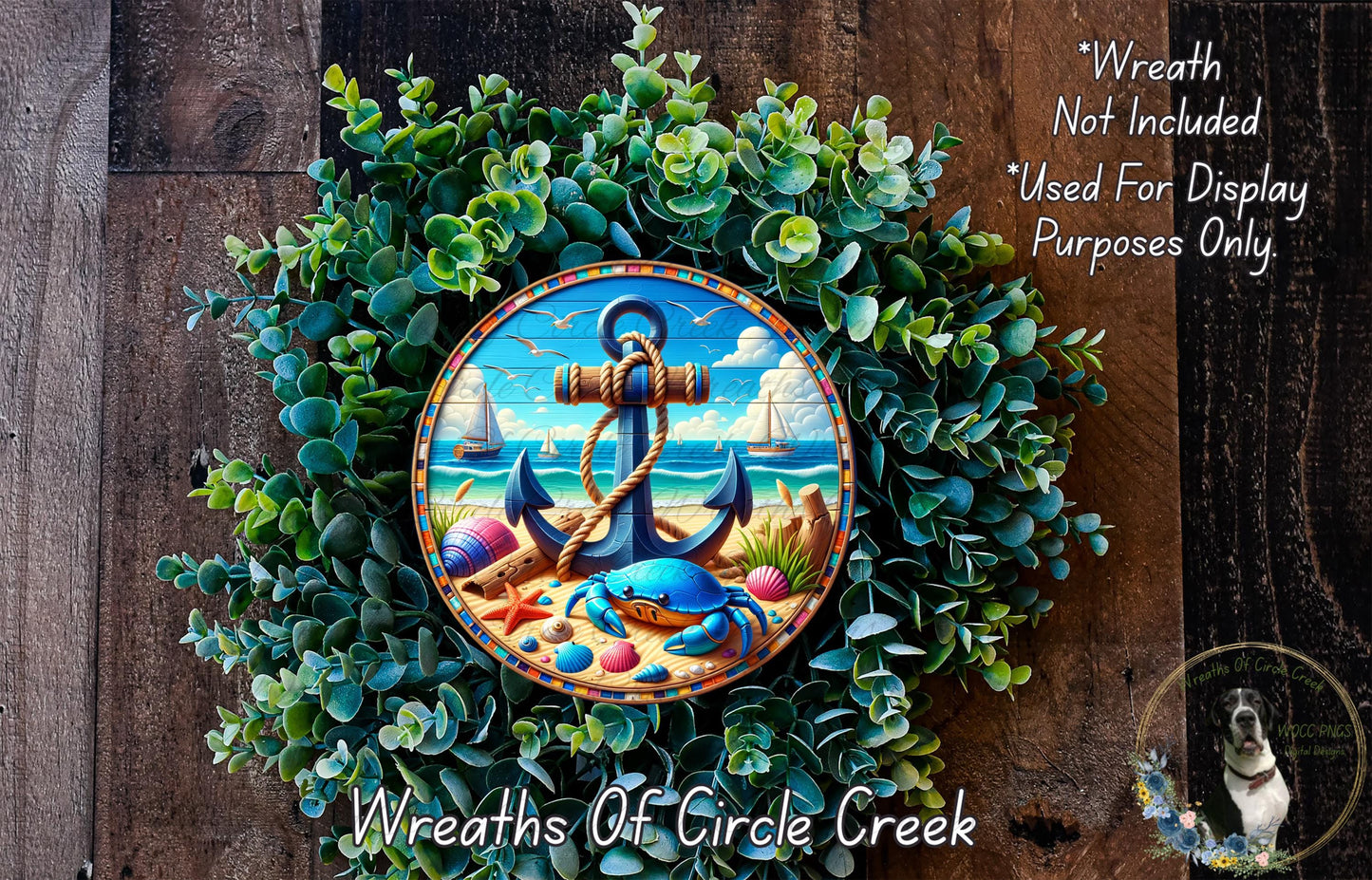 A wreath made of green foliage and featuring a blue anchor and a seascape design, with a small dog in the corner.