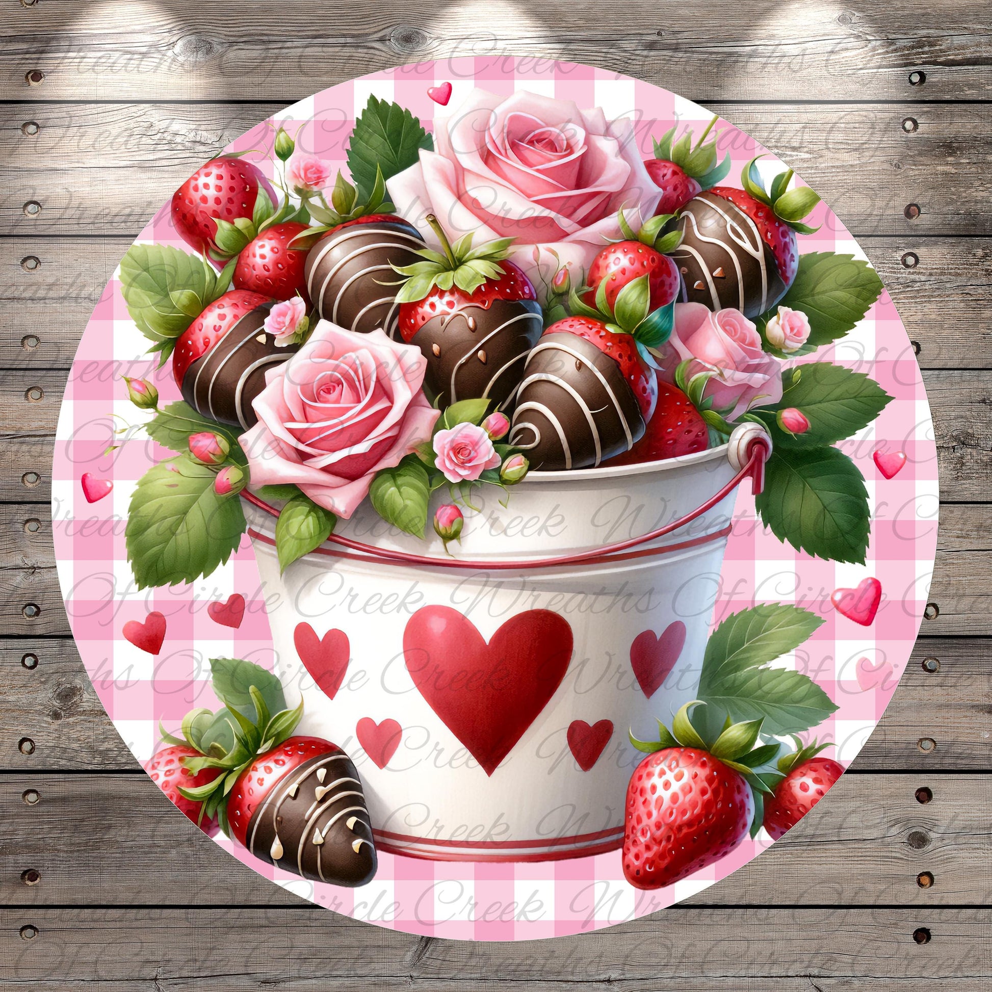 A bucket filled with chocolate-covered strawberries and roses, surrounded by hearts and leaves, set against a pink and white checkered background.