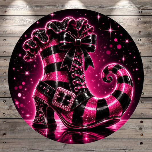 A vibrant, glittery, and sparkly pink and black striped boot with a bow on top, set against a starry night sky background.