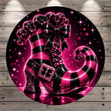 A vibrant, glittery, and sparkly pink and black striped boot with a bow on top, set against a starry night sky background.