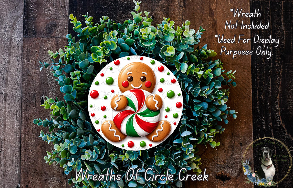 A wreath made of green plants and a gingerbread man figure, with the gingerbread man holding a candy cane.