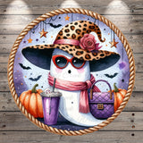 A whimsical illustration of a ghost wearing a leopard print hat, sunglasses, and holding a purple purse and a drink, surrounded by pumpkins and bats against a starry night sky background.
