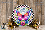 a decorative round sign with a butterfly design, surrounded by colorful flowers and foliage. The sign has a checkered border and the text "Faith Over Fear" written on it.