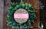 A wreath made of green and white plants, with the text "Hello Spring" displayed prominently in the center.