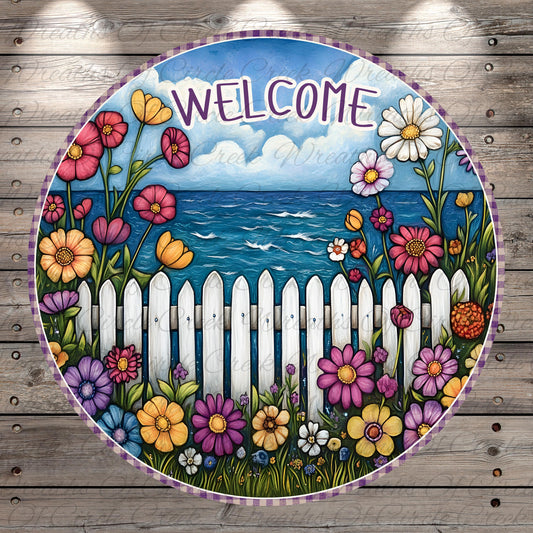 The image is a vibrant and colorful illustration of a white picket fence surrounded by a variety of flowers, with a beautiful ocean view in the background. The text "WELCOME" is prominently displayed in the center of the image.