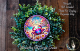 a wreath with a colorful crab design, surrounded by greenery and flowers, and a text overlay that reads "Welcome to Paradise" and "Wreaths of Circle Creek".