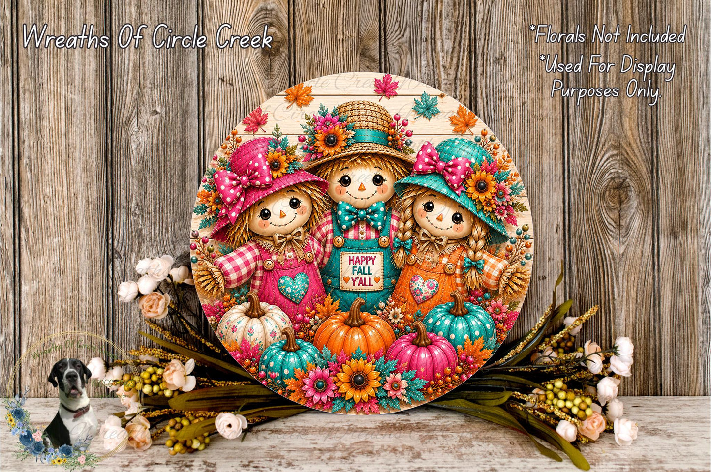 A decorative wreath featuring three scarecrow dolls surrounded by pumpkins, flowers, and autumn leaves, with the text "Wreaths Of Circle Creek" and "Happy Fall" displayed.