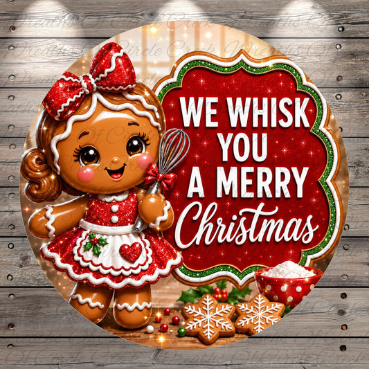 A cheerful gingerbread girl holding a whisk stands next to a sign that says "We whisk you a merry Christmas".