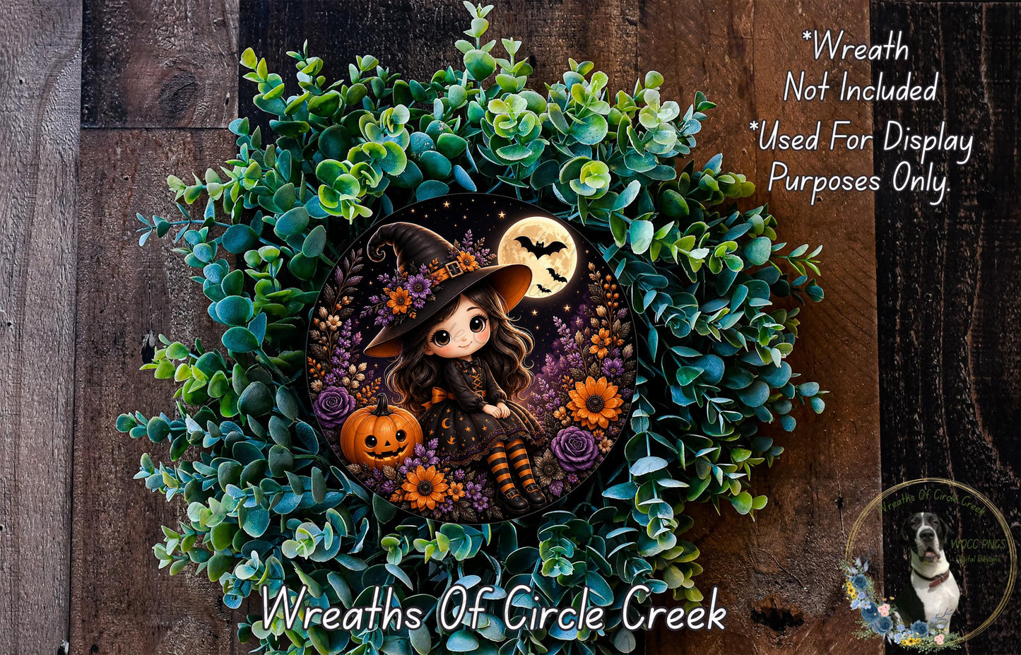 A Halloween-themed wreath featuring a cartoon girl dressed as a witch, surrounded by autumn foliage and pumpkins.