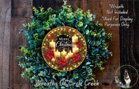 A festive Christmas wreath made of greenery and adorned with lit candles, featuring the text "Merry Christmas" and "Weights of Circle Creek".