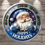 A circular holiday-themed decoration featuring a smiling Santa Claus figure surrounded by snowflakes, holly leaves, and Christmas ornaments. The text "HAPPY HOLIDAYS" is prominently displayed in the center of the decoration.