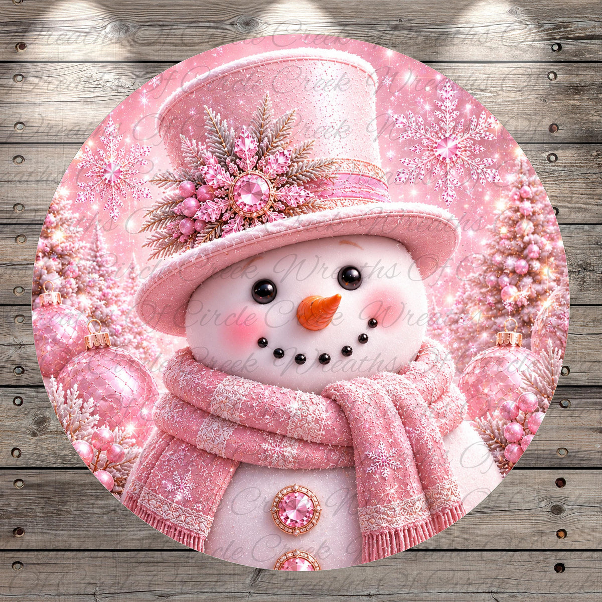 A pink snowman with a top hat and scarf, surrounded by pink and white Christmas decorations, is the central focus of the image.