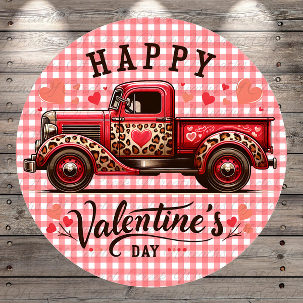 A vintage red truck with leopard print accents and hearts on the sides, along with the text "Happy Valentine's Day" on a red and white checkered background.