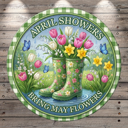 A circular sign with a floral design, featuring a pair of green rain boots in the center surrounded by colorful flowers, butterflies, and a pond. The sign has the text "April Showers Bring May Flowers" written around the edge.