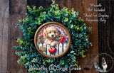 A wreath with a golden retriever puppy wearing a red bow tie and holding a red rose, surrounded by green foliage.