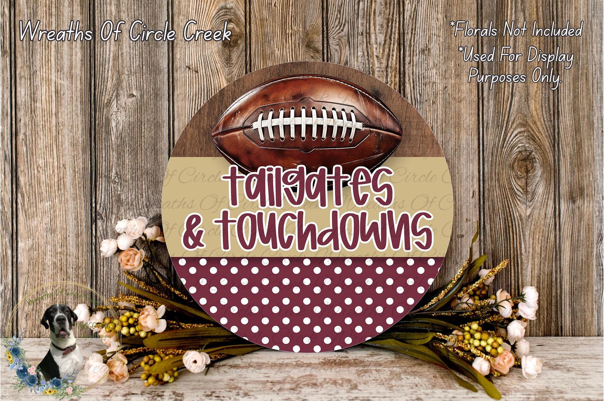 a decorative sign with a football and the words "tailgates & touchdowns" written on it, surrounded by a floral arrangement and a wooden background.