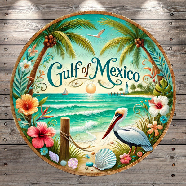A circular plate with a tropical beach scene, featuring palm trees, a bird, flowers, and a lighthouse. The text "Gulf of Mexico" is prominently displayed in the center of the plate.