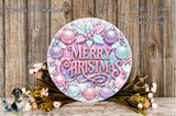 A festive wreath with the text "Merry Christmas" displayed prominently, surrounded by various ornaments and flowers. The wreath is placed on a wooden surface, and there is a small dog figurine in the background.