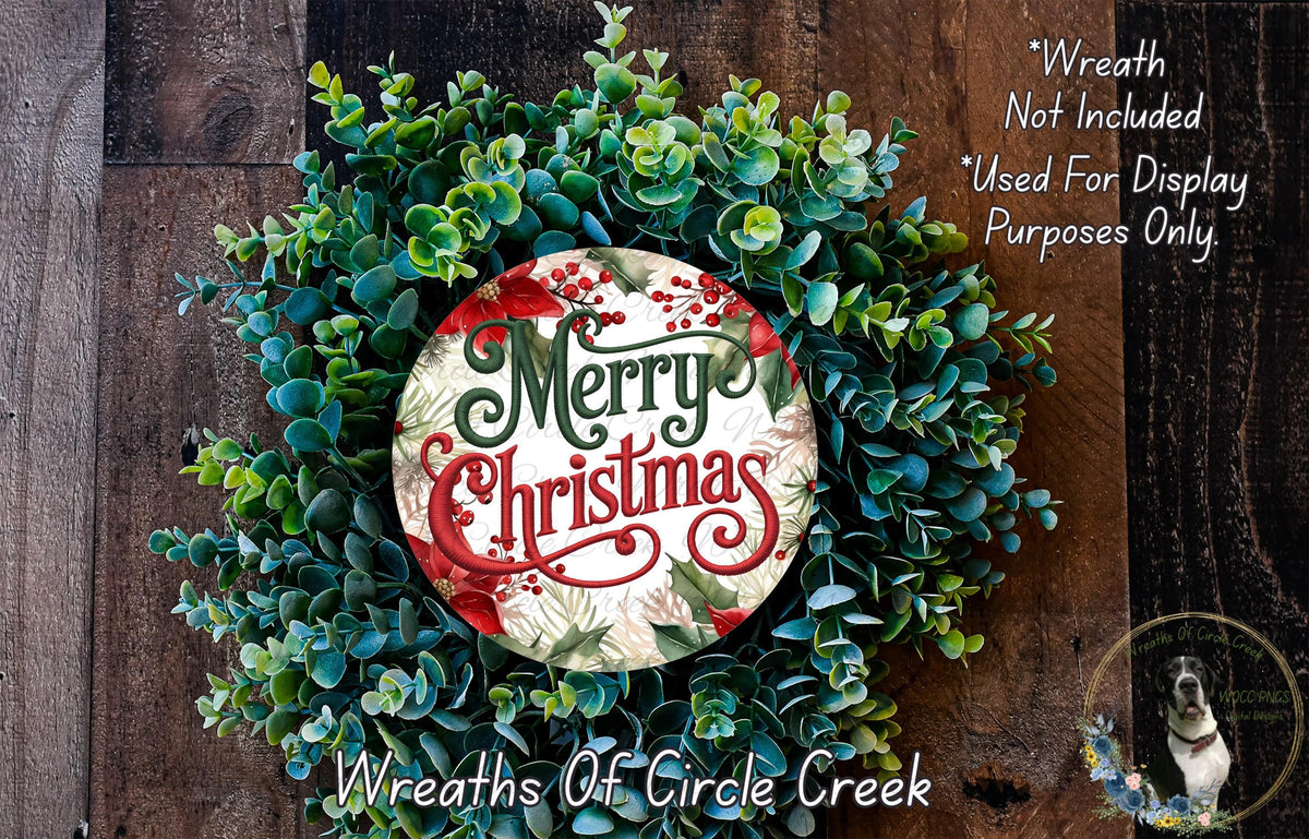 A wreath made of green and red foliage, with a circular sign that says "Merry Christmas" in the center.