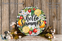 A decorative wreath with the text "Hello Summer" surrounded by various fruits and flowers, placed on a wooden surface.