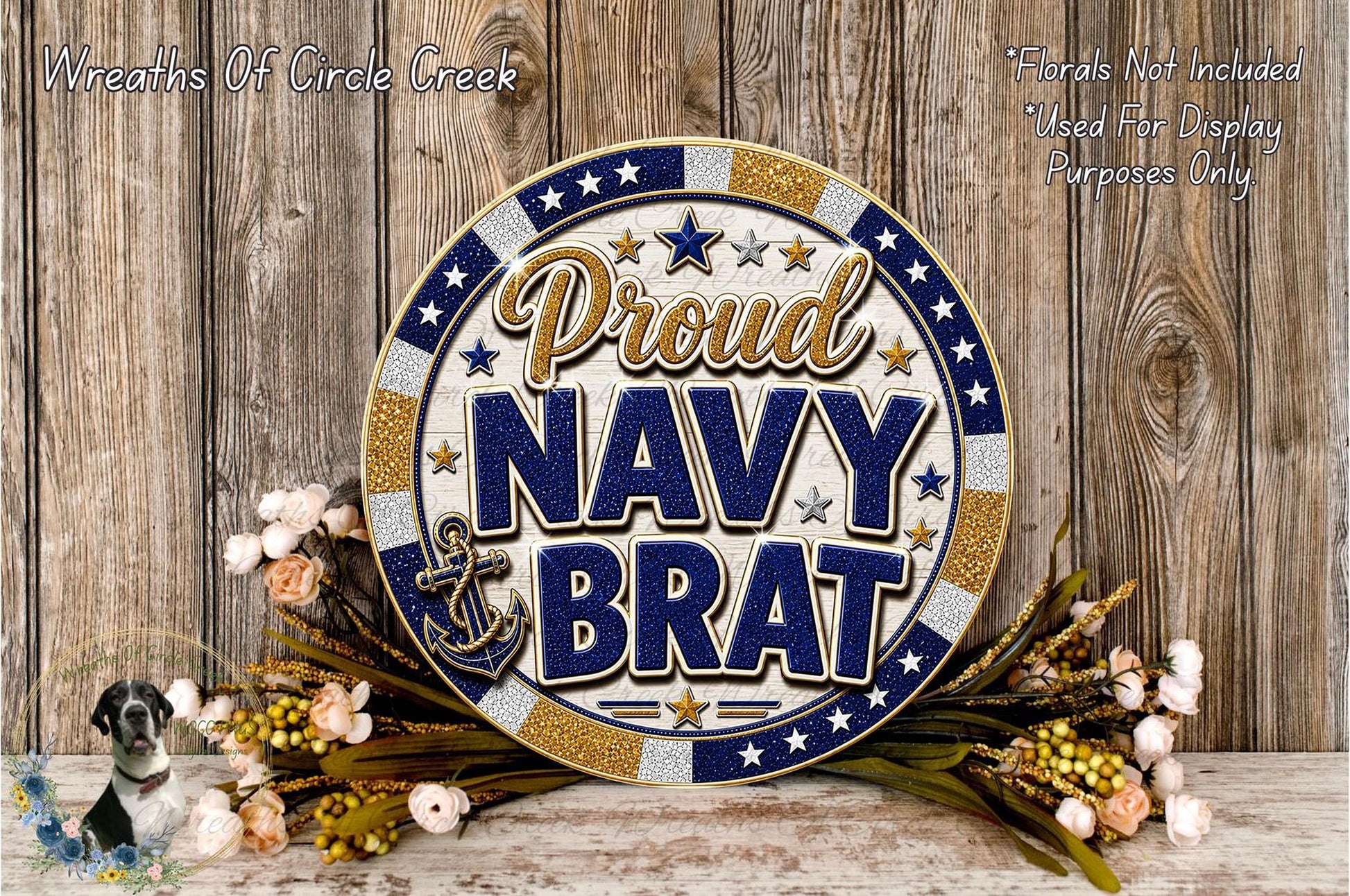 a decorative sign with the text "Proud Navy Brat" surrounded by a floral arrangement.