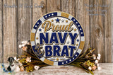 a decorative sign with the text "Proud Navy Brat" surrounded by a floral arrangement.