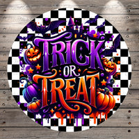 a Halloween-themed design with the text "TRICK OR TREAT" prominently displayed. The design includes various Halloween-related elements such as bats, pumpkins, and a castle, all set against a black and white checkered background.