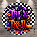 a Halloween-themed design with the text "TRICK OR TREAT" prominently displayed. The design includes various Halloween-related elements such as bats, pumpkins, and a castle, all set against a black and white checkered background.