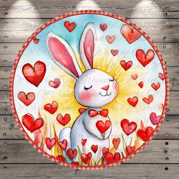 A whimsical illustration of a rabbit surrounded by a field of red hearts, with the rabbit holding a heart in its paws.