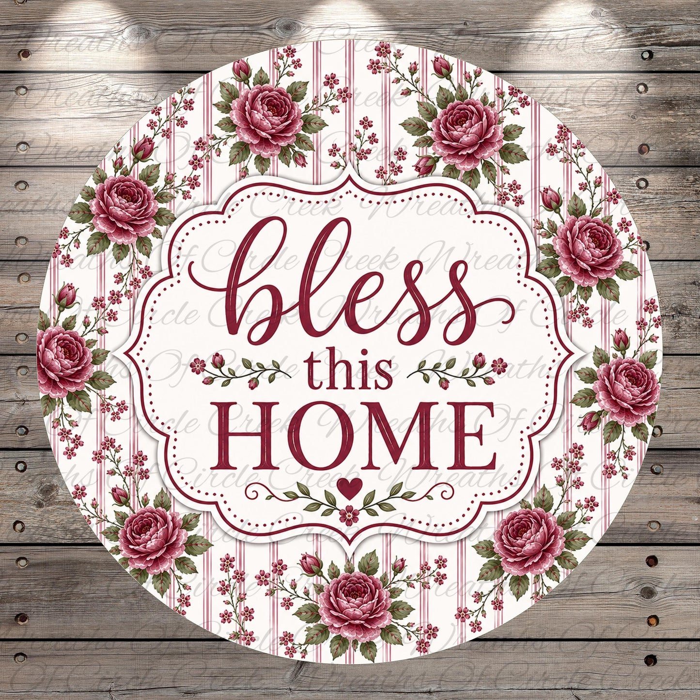 A round floral-patterned sign with the text "bless this home" in a decorative font.