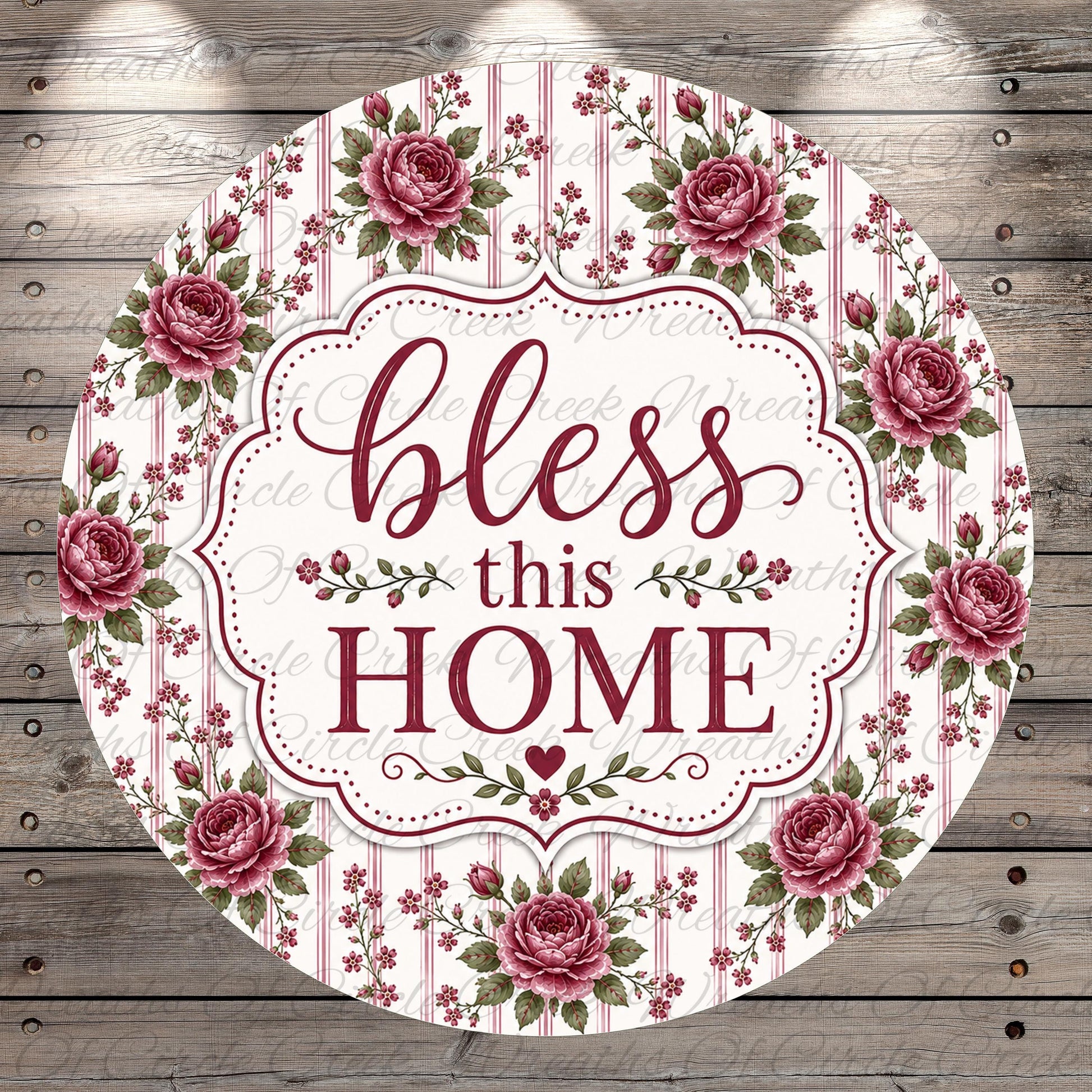 A round floral-patterned sign with the text "bless this home" in a decorative font.