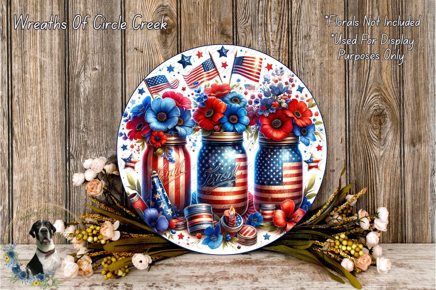 A decorative plate featuring three mason jars filled with colorful flowers, surrounded by American flags and other patriotic elements, placed on a wooden surface.